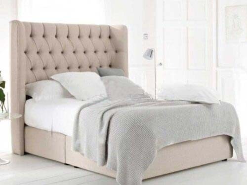 cream sleigh bed